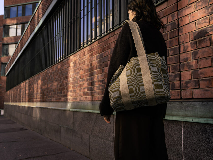 Shopping bag by Johanna Gullichsen in durable woven cotton fabric, featuring a distinctive Normandie pattern. Woven and sewn in Finland.